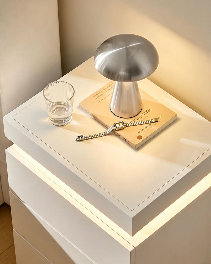 Close-up of white Kumar bedside table high gloss tabletop with smooth reflective finish