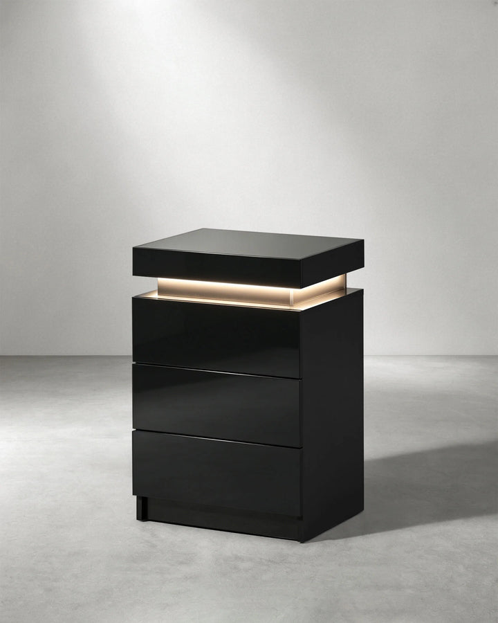 Side view of black Kumar LED light bedside table with contemporary high gloss finish