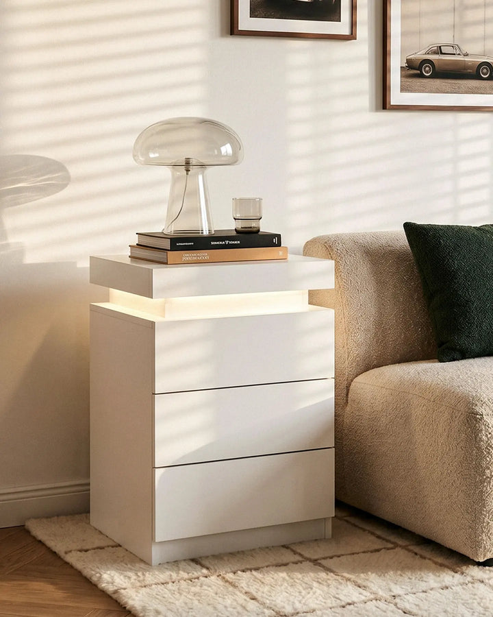 Front view of the white LED bedside table styled in a contemporary British bedroom.