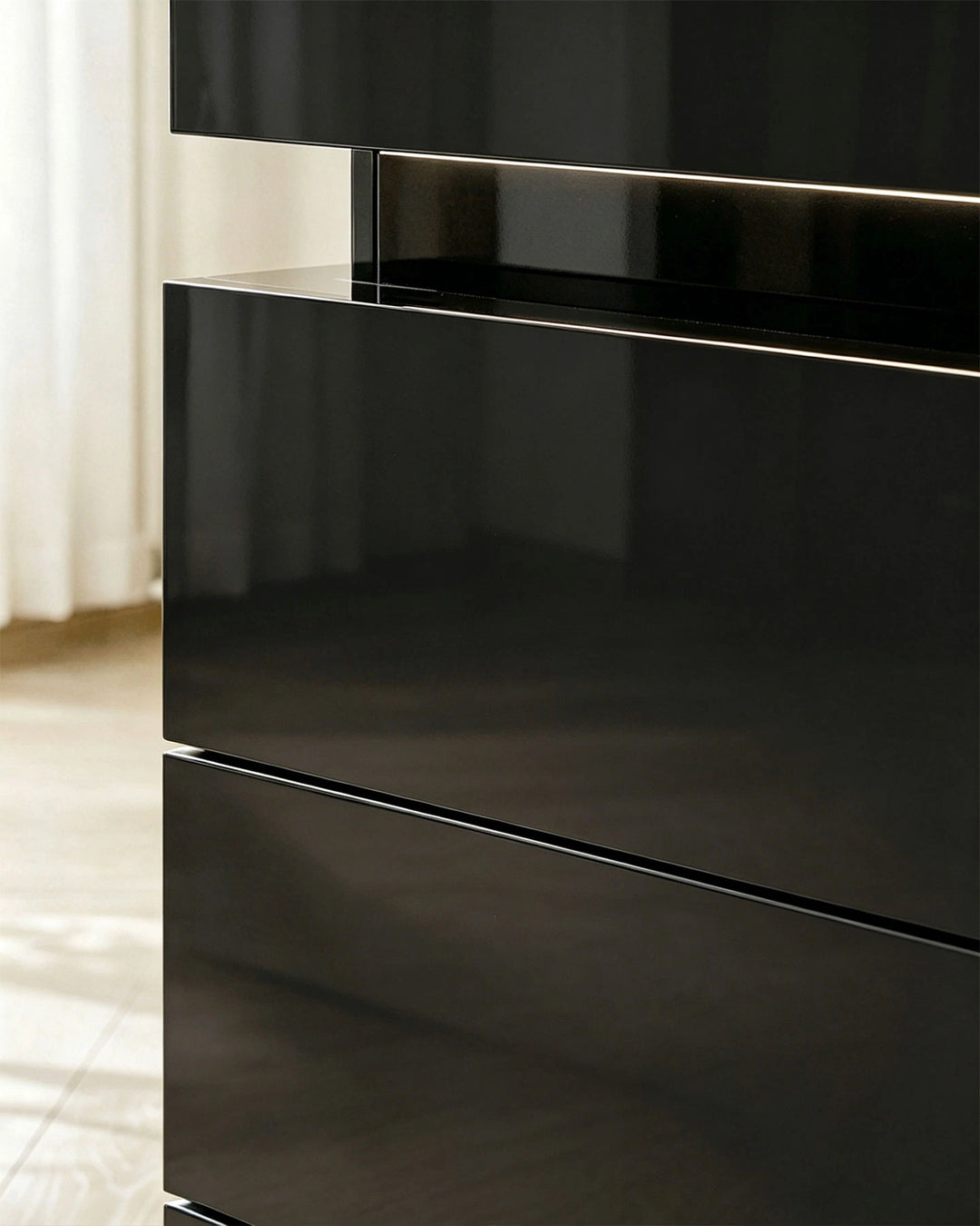 Side view of the black smart nightstand highlighting its minimalist design and gloss finish.