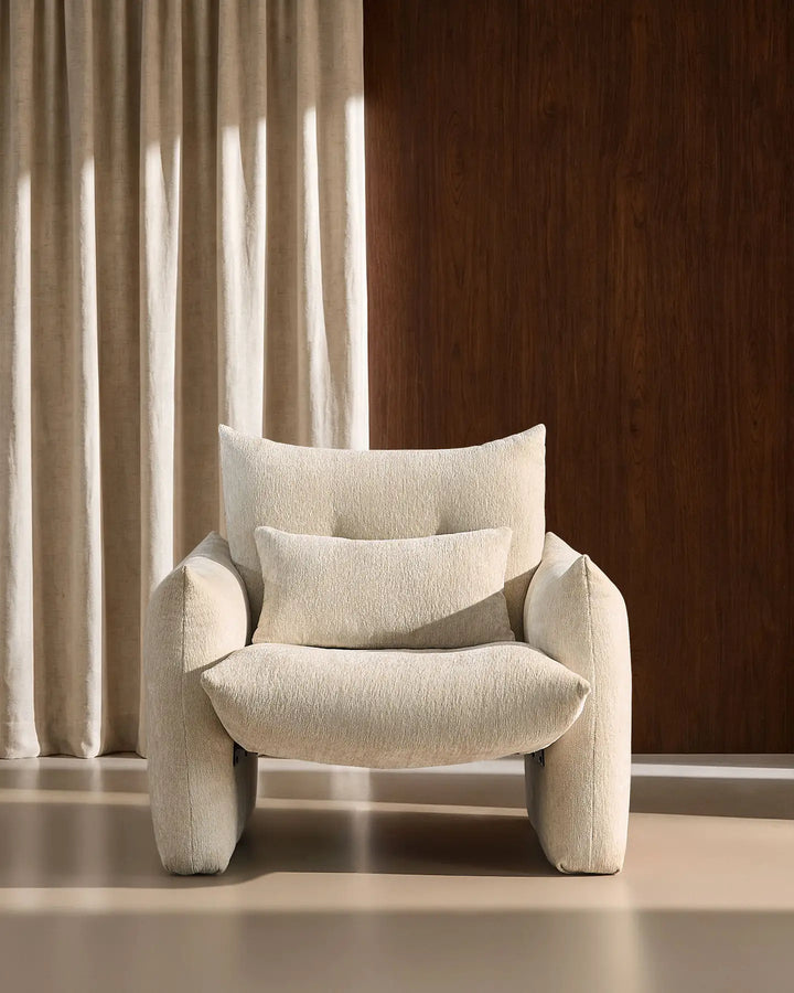 Front view of the cream Kumo Accent Chair with deep cushioning and soft chenille upholstery