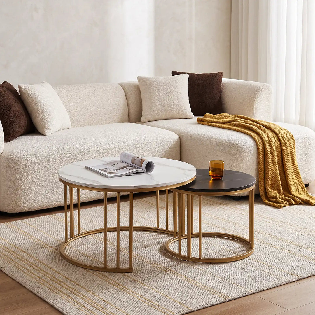 Lepore Black and White Marble Nesting Coffee Table Set in a modern living room