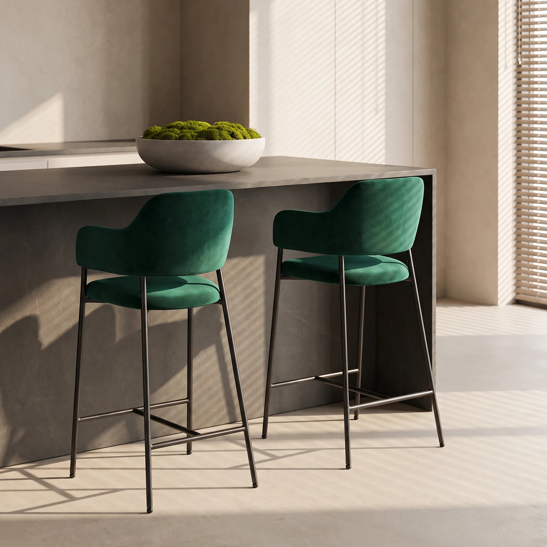 A set of 2 bar stools beside the kitchen island