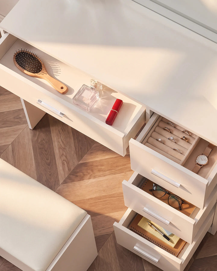 Open drawers of the Luna dressing table displaying storage space for cosmetics, makeup brushes and beauty essentials.