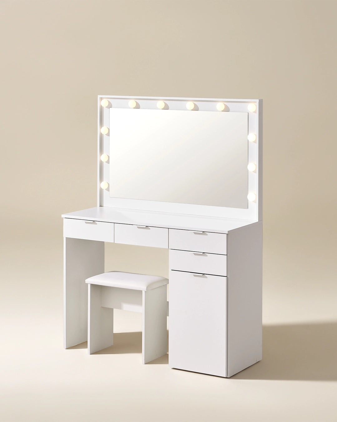 Lunea white dressing table set viewed from the side, showing its clean-lined design, LED mirror and space-saving stool arrangement.