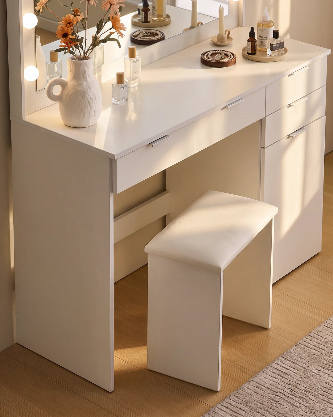 Matching stool paired with the Lunea white dressing table, highlighting the compact design and coordinated finish of the vanity set.
