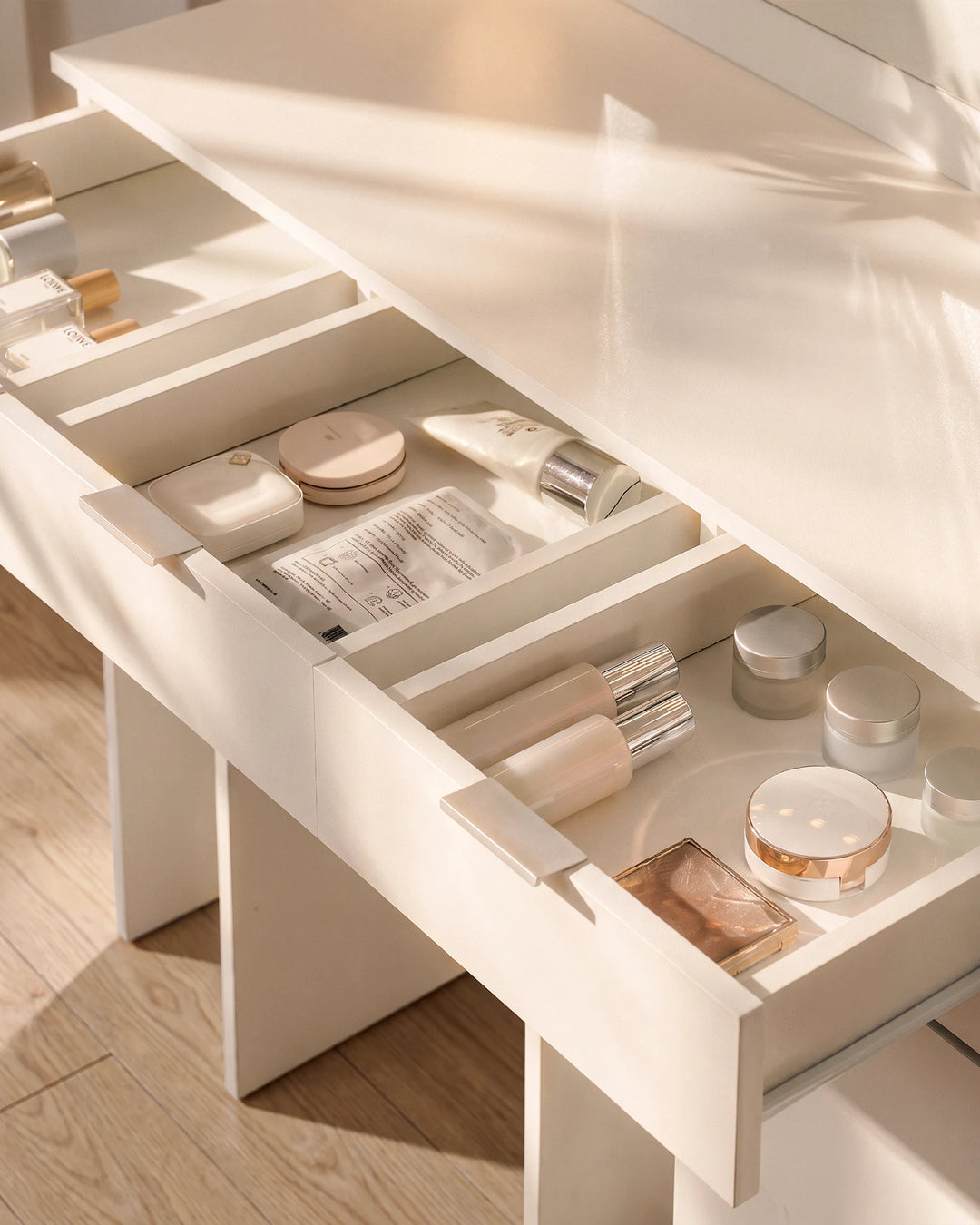 Lunea white dressing table with organised storage compartments, showing the drawer space and room for makeup, skincare products and beauty accessories.
