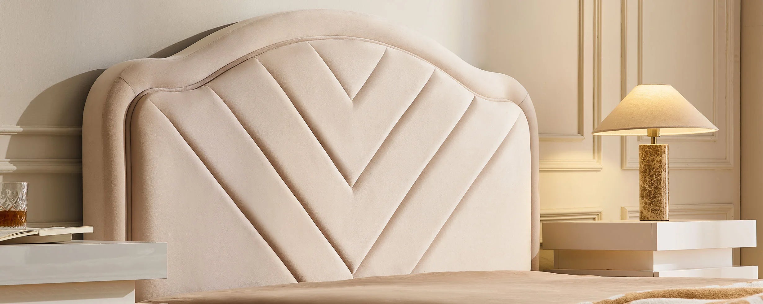 Close-up of velvet upholstered headboard on Luniva double bed frame with soft texture and V-stitch detail
