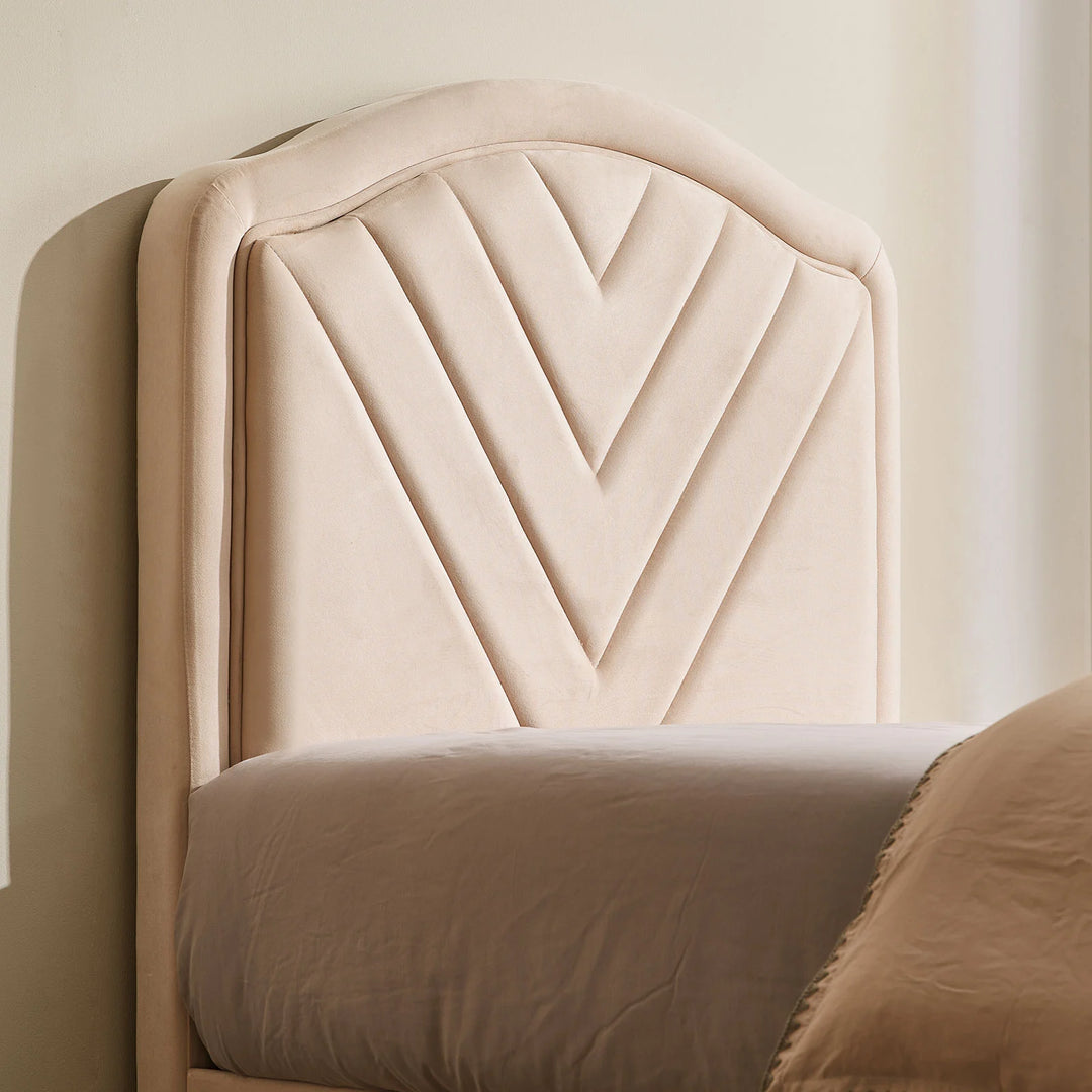 Headboard detail of the Luniva Cream LED Single Bed Frame with diamond stitching and velvet upholstery