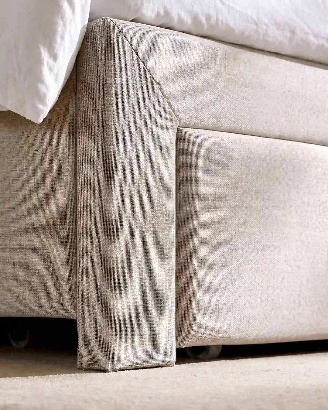 Detail view of Luvon bed frame legs and elevated base design