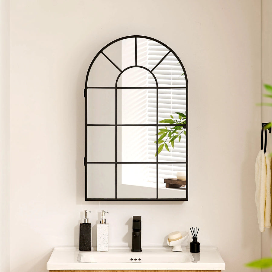Margot arched Mirror above bathroom sink, cabinet doors closed