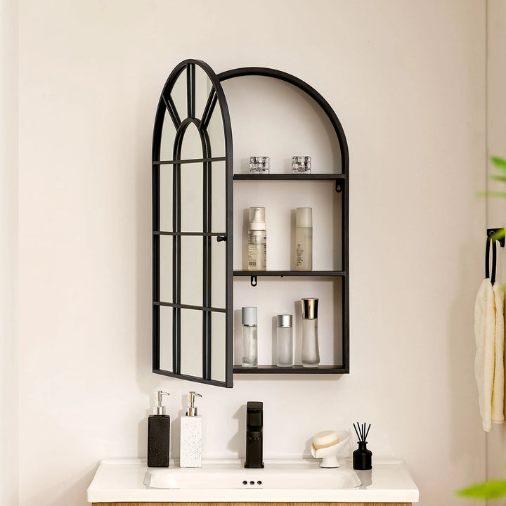 Margot arched Mirror above bathroom sink, cabinet doors open with toiletries and makeup on three inner shelves