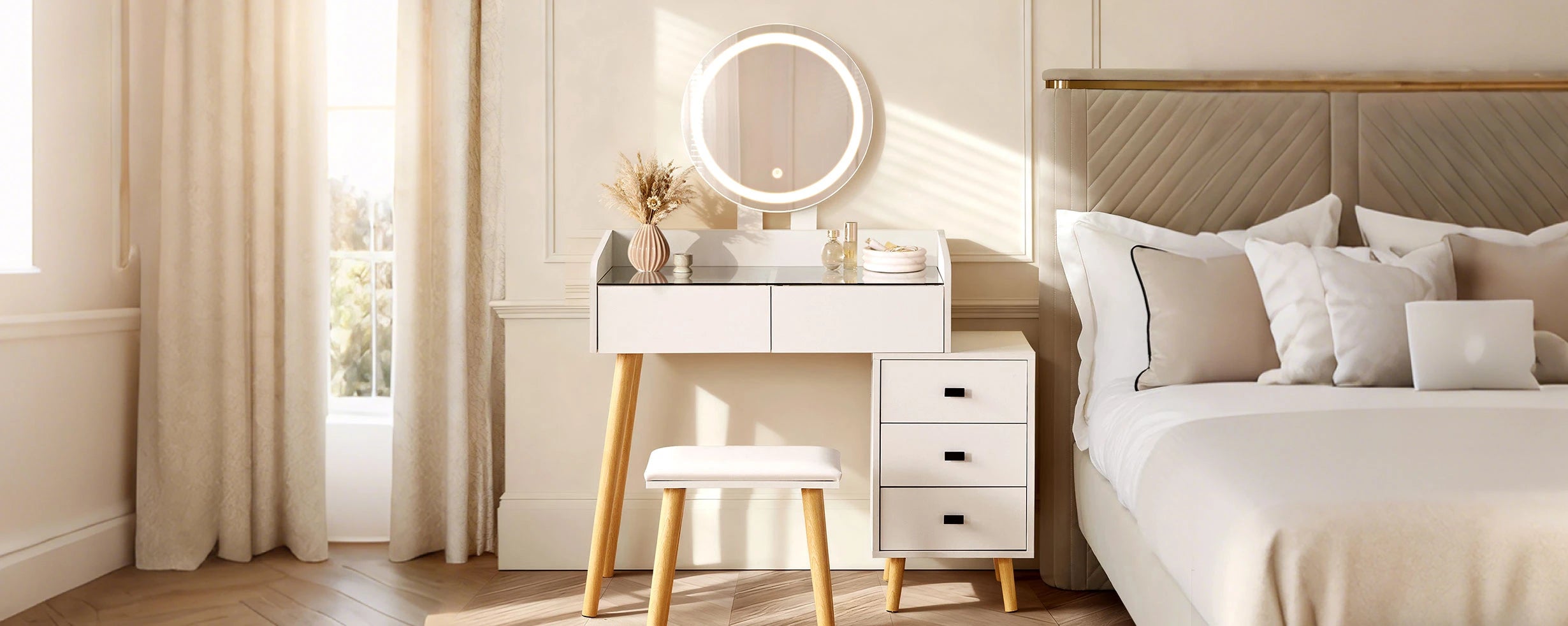 Marilee dressing table with round LED mirror lights switched on beside the bed