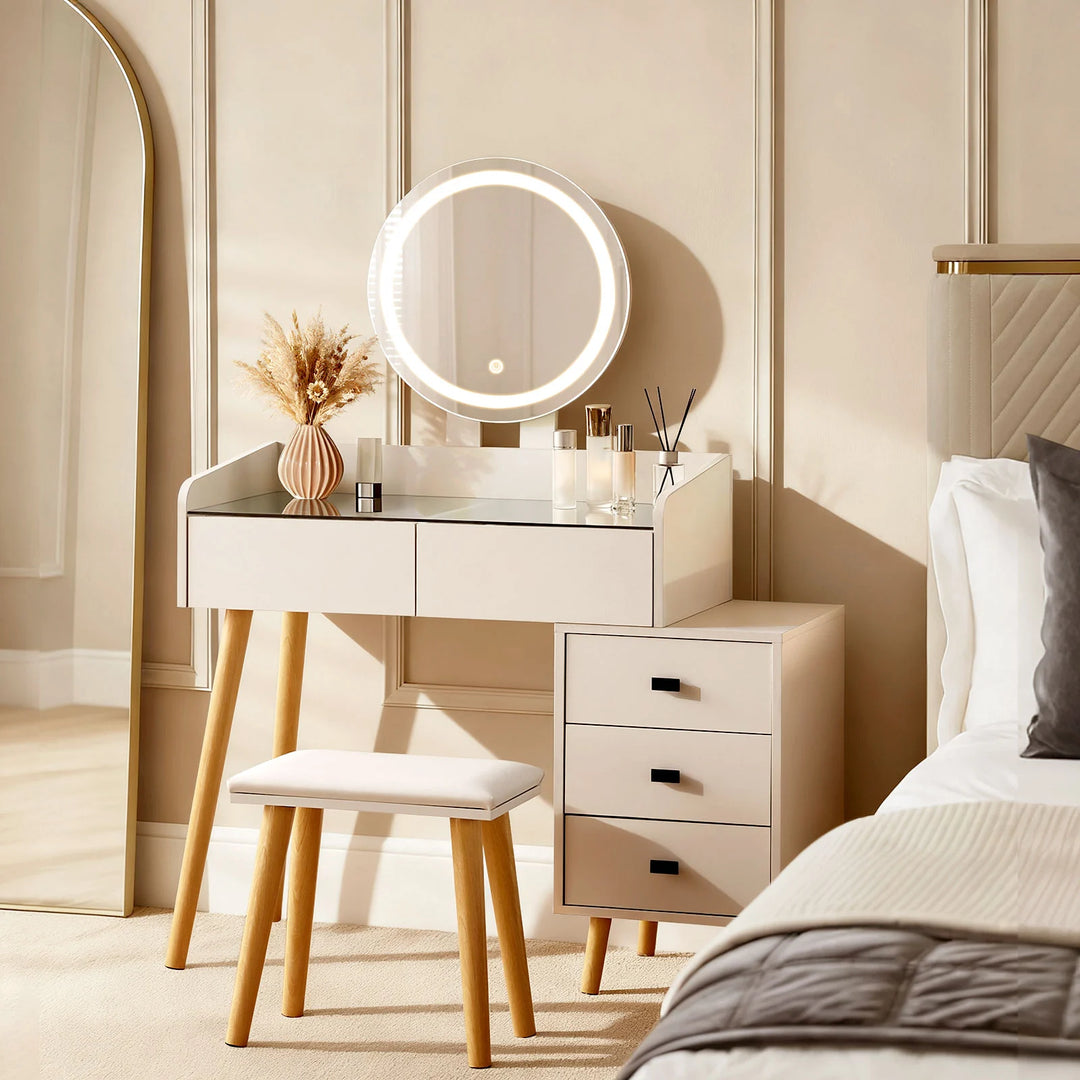 Marilee LED light dressing table beside a bright bedroom bed