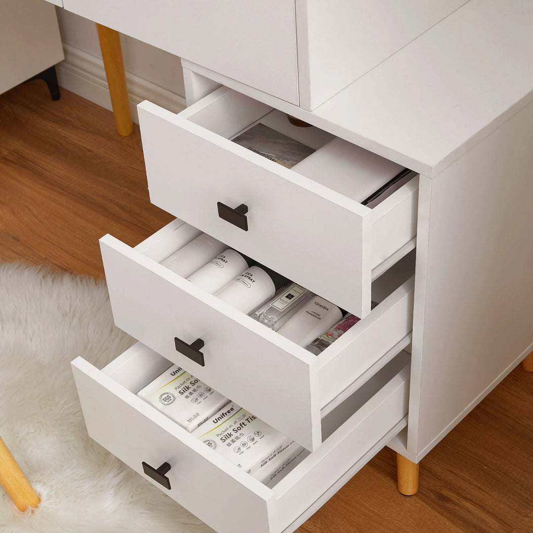 Three-tier drawer cabinet of the Marilee set opened for makeup storage