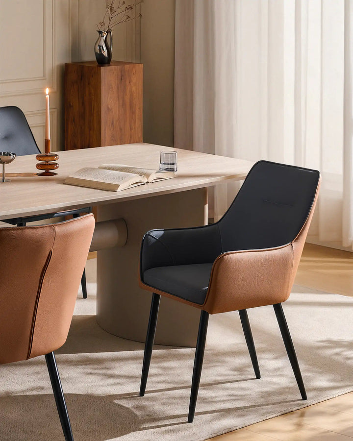 grey Maxine Dining Chair beside a modern dining table in a contemporary dining room