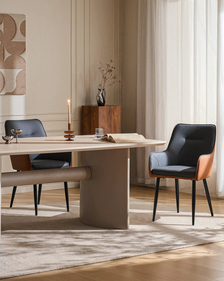 grey Maxine Dining Chair styled in a modern dining space with dining table setting