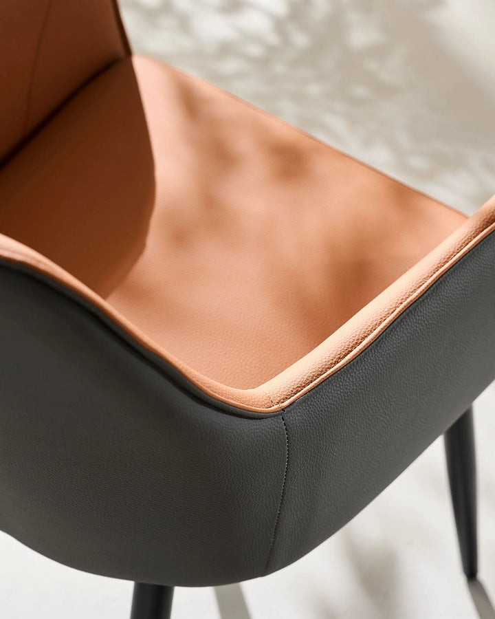 Brown Maxine Dining Chair top view showing two-tone faux leather and armrest detail