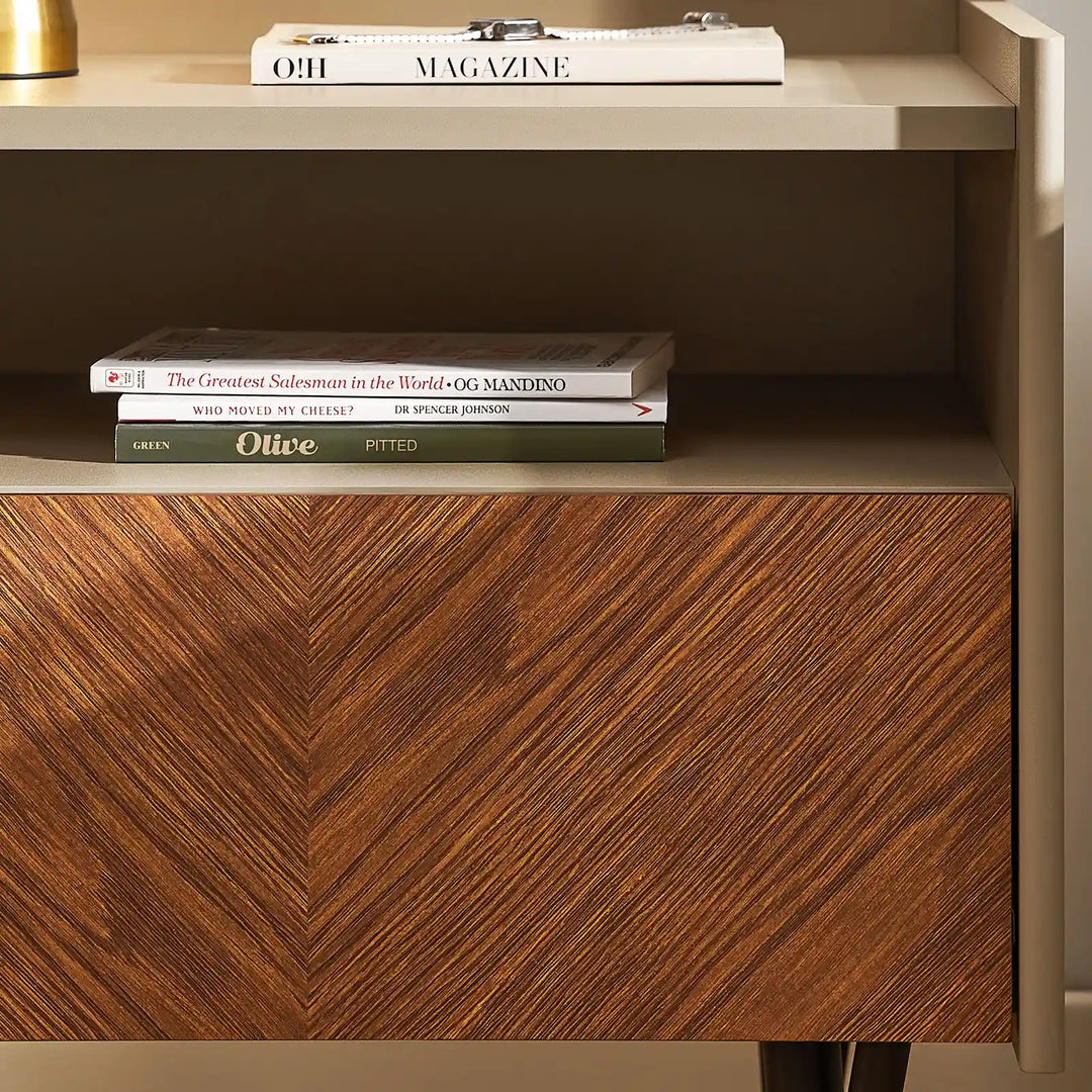 Front close-up of Milano Bedside Table with walnut wood drawer and books on shelf