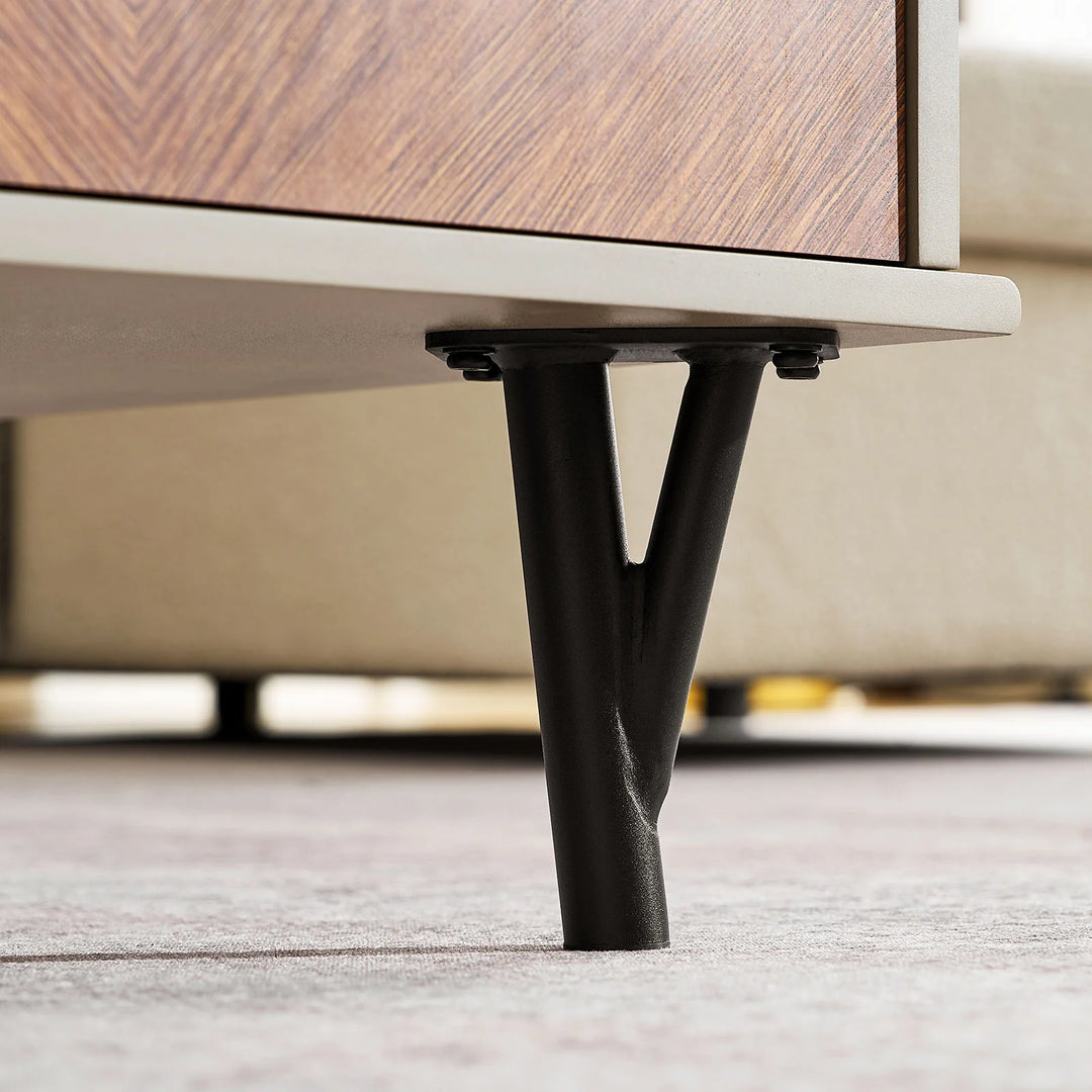 Close-up of Milano Coffee Table black painted metal legs in branch shape, reflecting natural design style