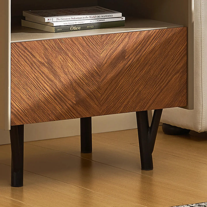Front close-up of Milano Bedside Table with walnut wood drawer and books on shelf