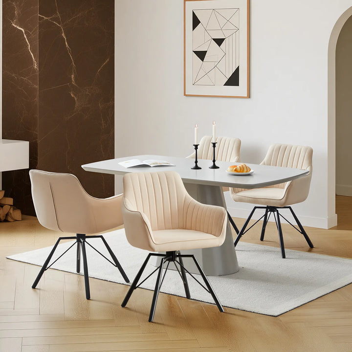 Set of four cream Milo velvet dining chairs around a dining table