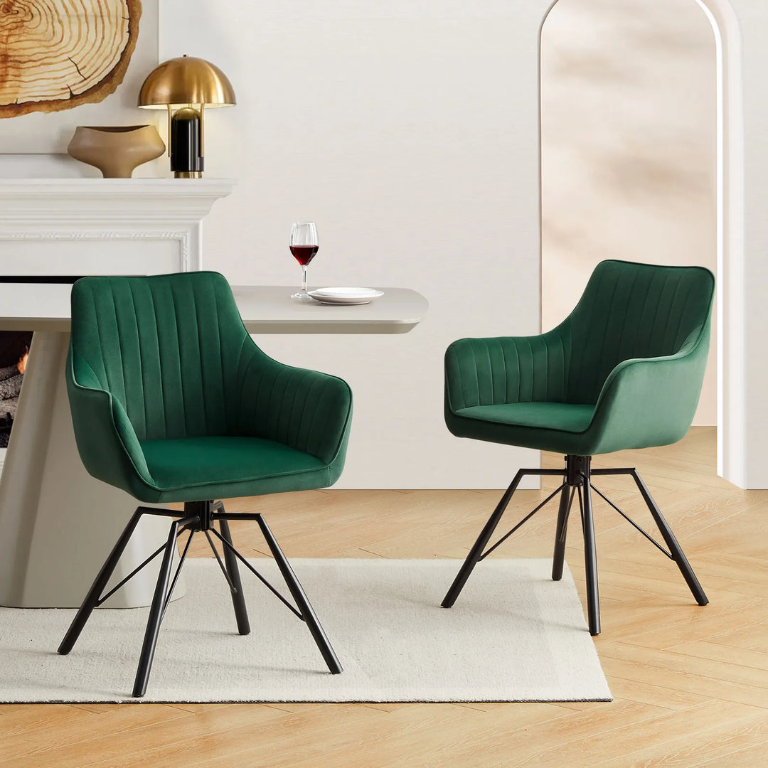 Two green Milo swivel chairs are styled around a dining table