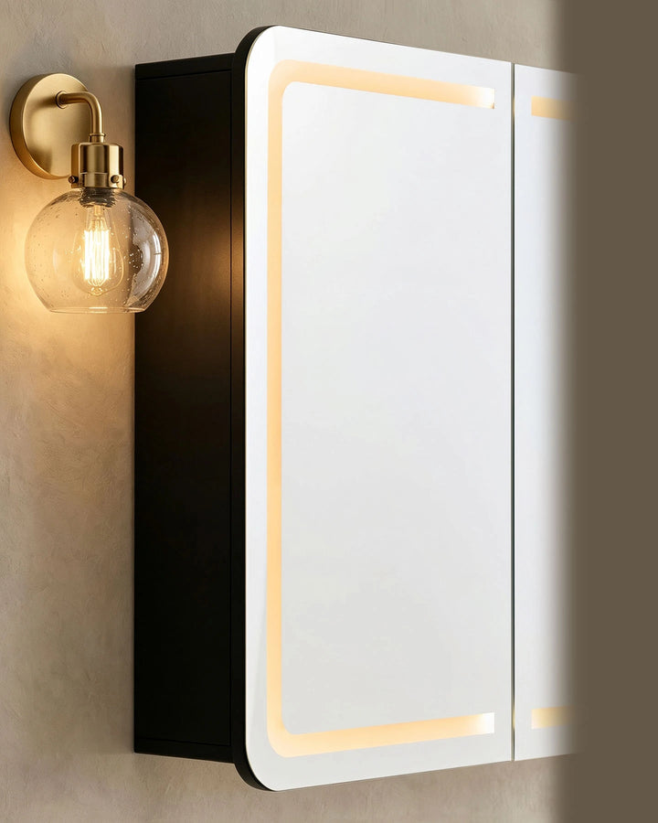 Close-up of Mira bathroom mirror cabinet mirror surface with integrated LED light strip