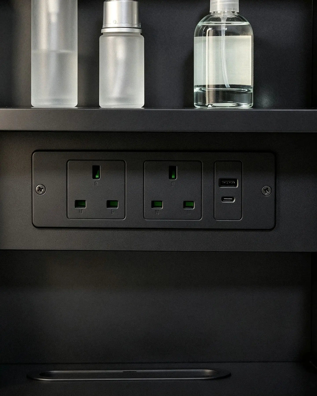 Mira bathroom mirror cabinet integrated with 2 AC outlets, 1 USB-A and 1 USB-C port. 
