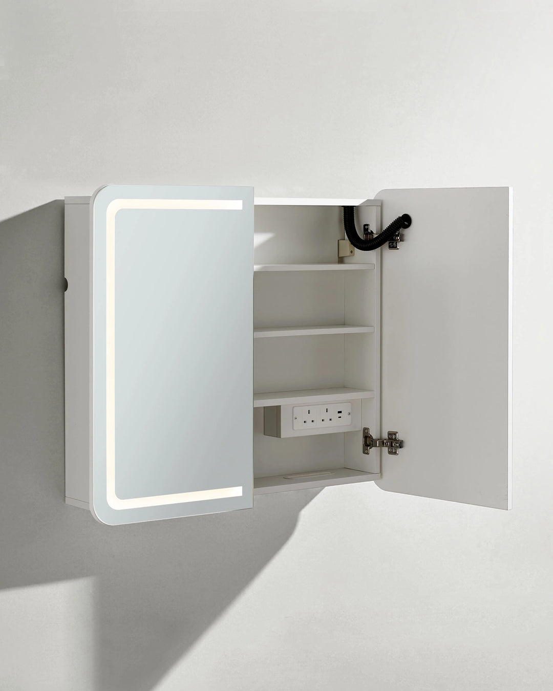 Mira bathroom mirror cabinet side view with partially open door on white background