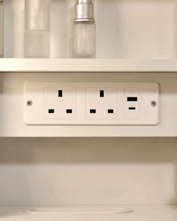 Mira bathroom mirror cabinet integrated with 2 AC outlets, 1 USB-A and 1 USB-C port. 