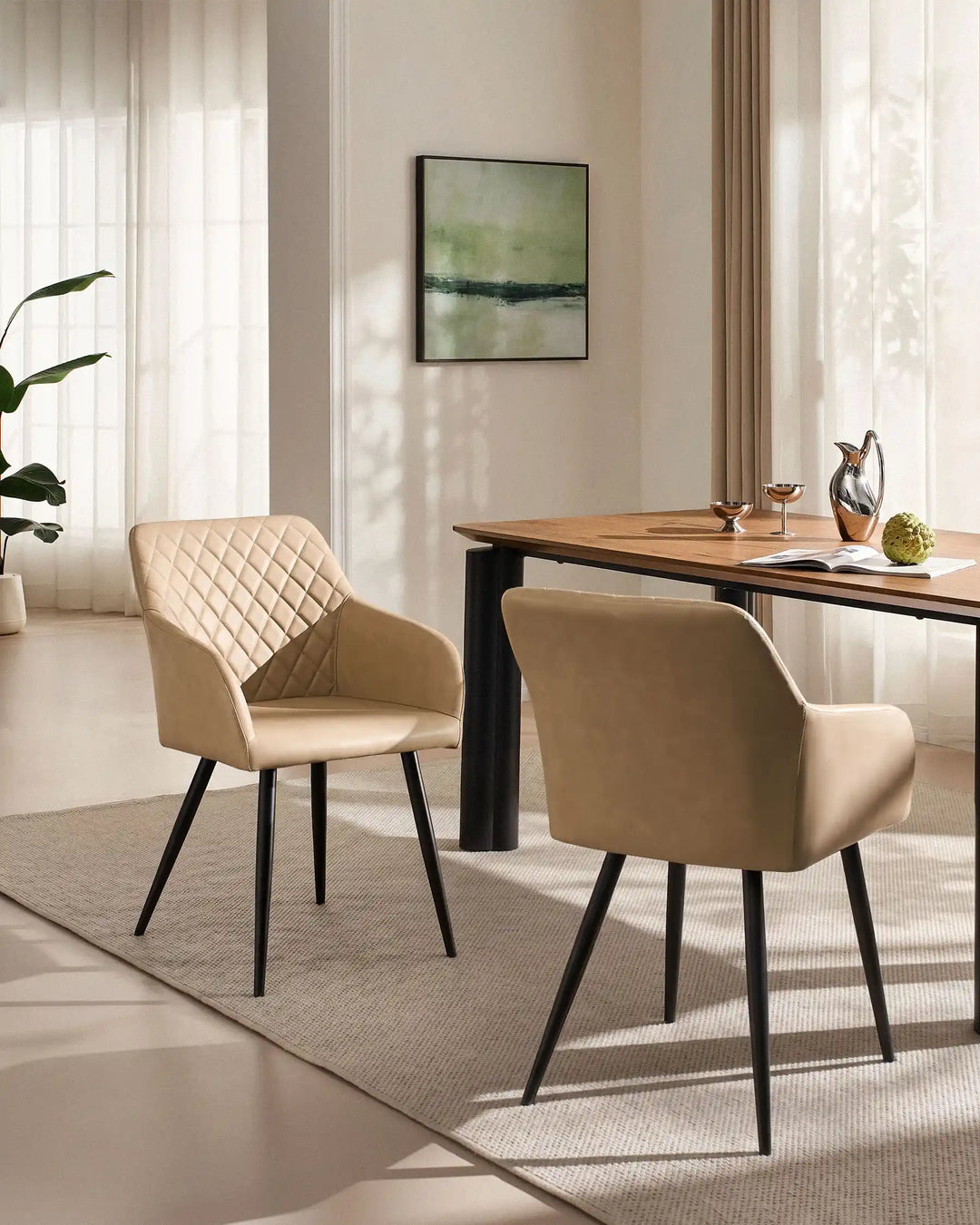 Moree beige Faux Leather Dining Chairs Styled Beside Modern Dining Table in Contemporary Dining Room