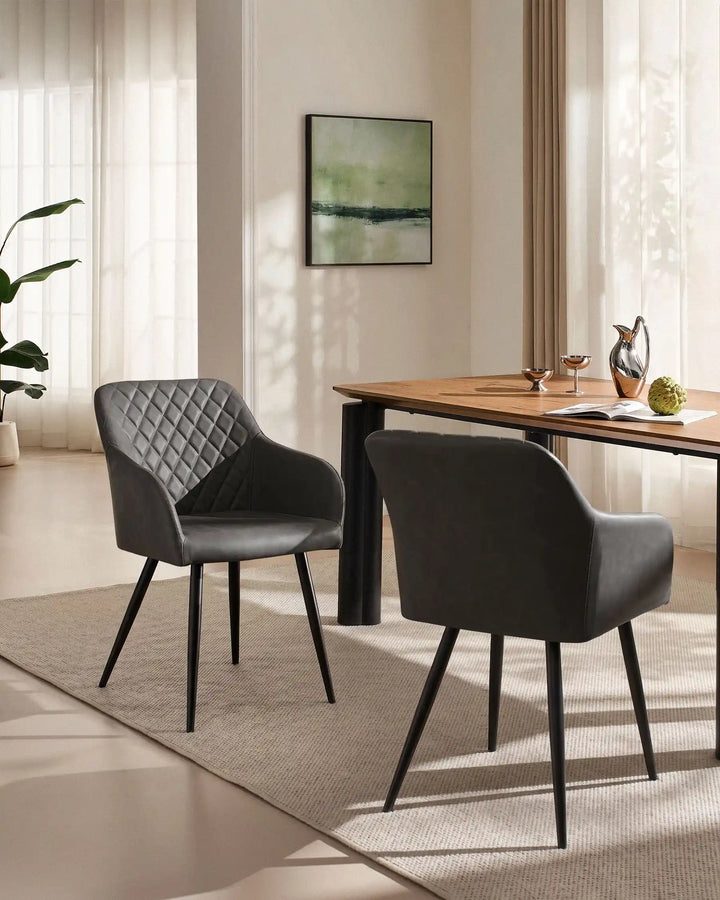 Moree dark grey Faux Leather Dining Chairs Styled Beside Modern Dining Table in Contemporary Dining Room