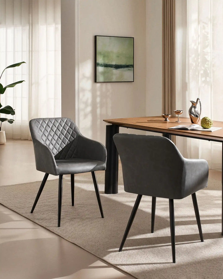 Moree light grey Faux Leather Dining Chairs Styled Beside Modern Dining Table in Contemporary Dining Room