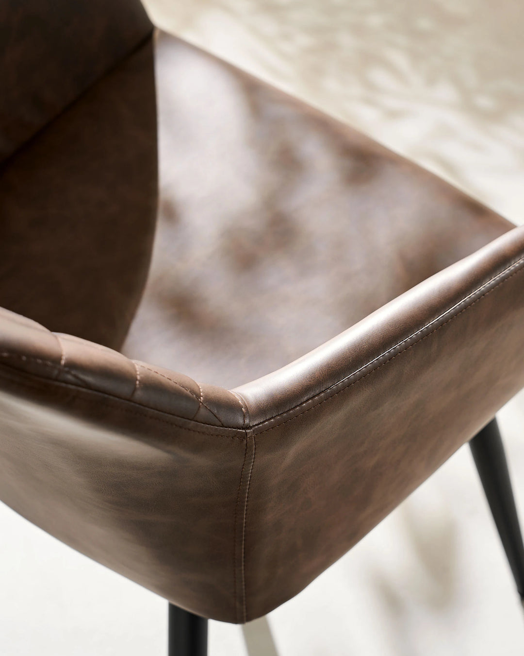 Top View of Wide Padded Seat on Moree Brown Faux Leather Dining Chair