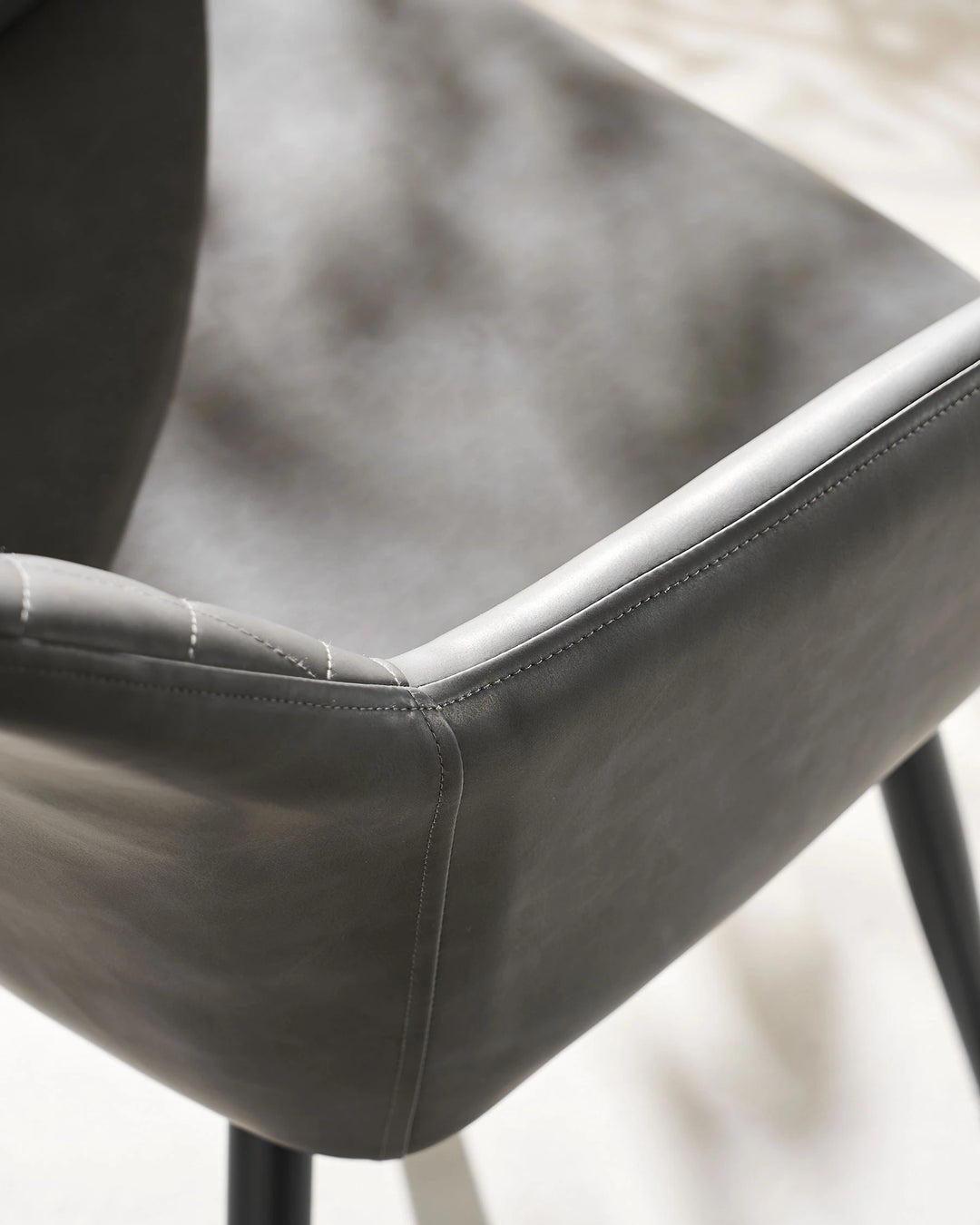 Top View of Wide Padded Seat on Moree dark grey Faux Leather Dining Chair