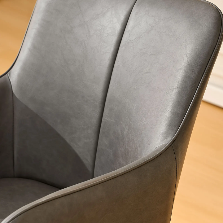 Backrest detail of Muhsina grey faux leather dining chair with stitched design