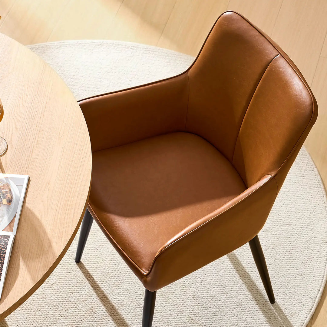 Top view seat detail of Muhsina brown faux leather dining chair with padded cushion