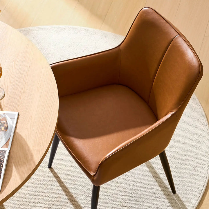 Top view seat detail of Muhsina brown faux leather dining chair with padded cushion