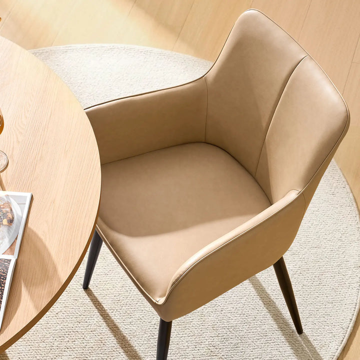 Top view seat detail of Muhsina beige faux leather dining chair with padded cushion
