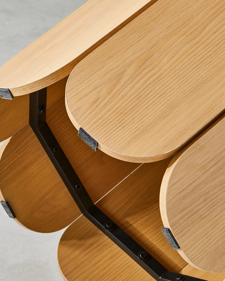 Underside view of the Nara dining table showing the tabletop support structure and the construction of its sculptural pedestal base