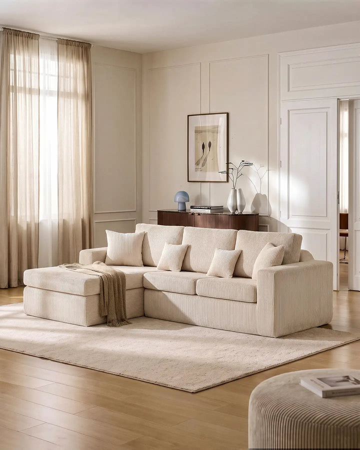 Nodo cream modular corner sofa with chaise in a modern living room