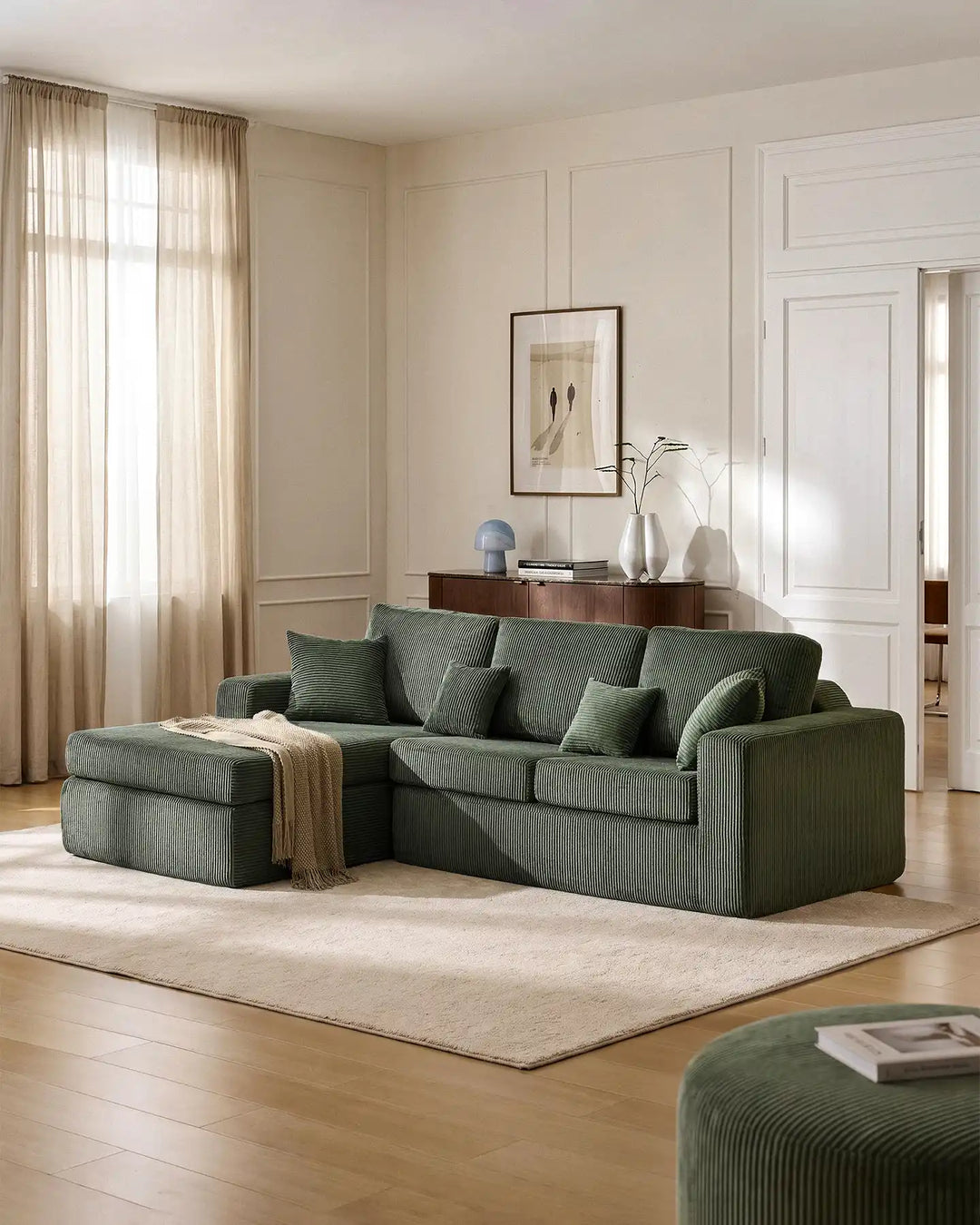 Nodo green modular corner sofa with chaise in a modern living room