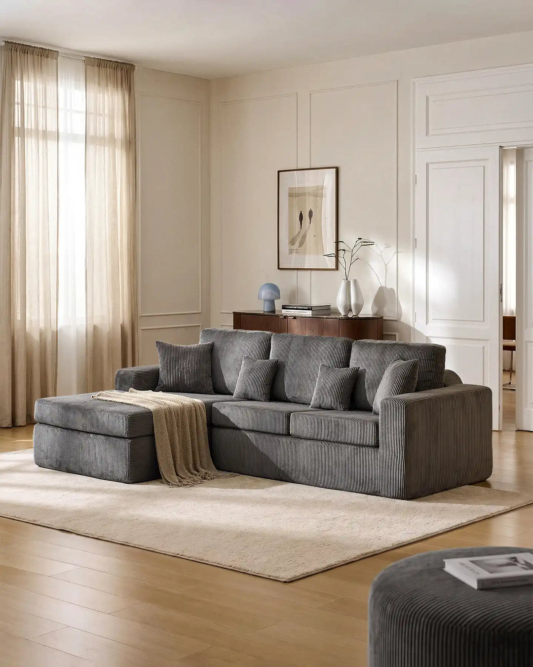 Nodo grey modular corner sofa with chaise in a modern living room