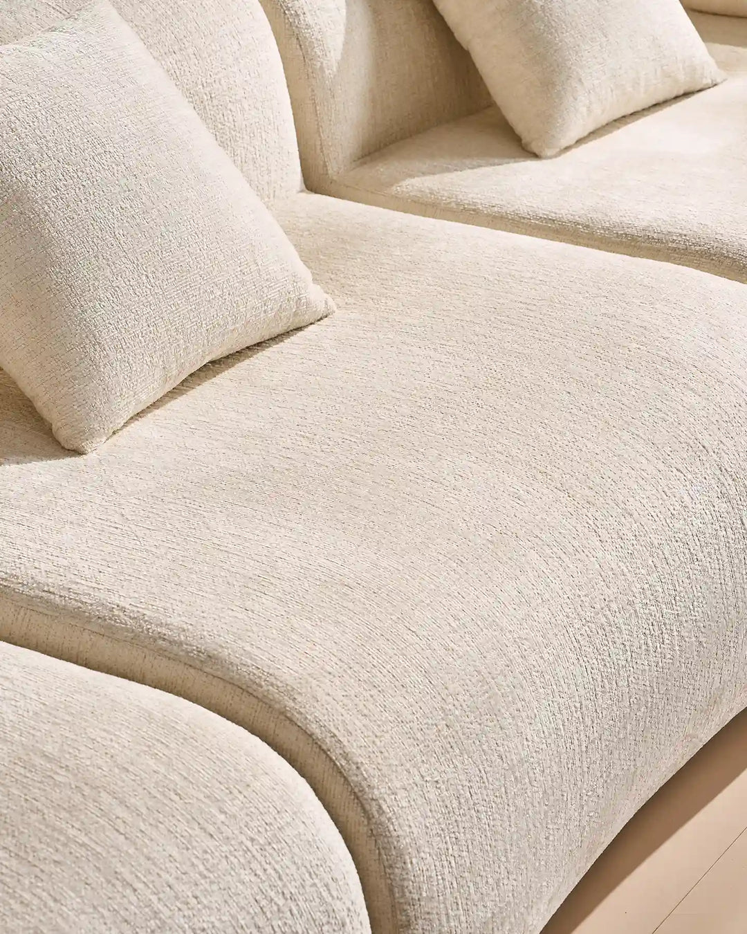 Close-up of the high-quality stitching and thick cushioning on the Nola modular seat section.