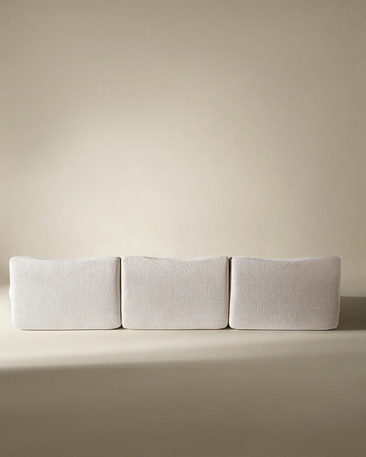 Rear view of the Nola sofa, showcasing the clean, finished back suitable for open-plan living spaces.