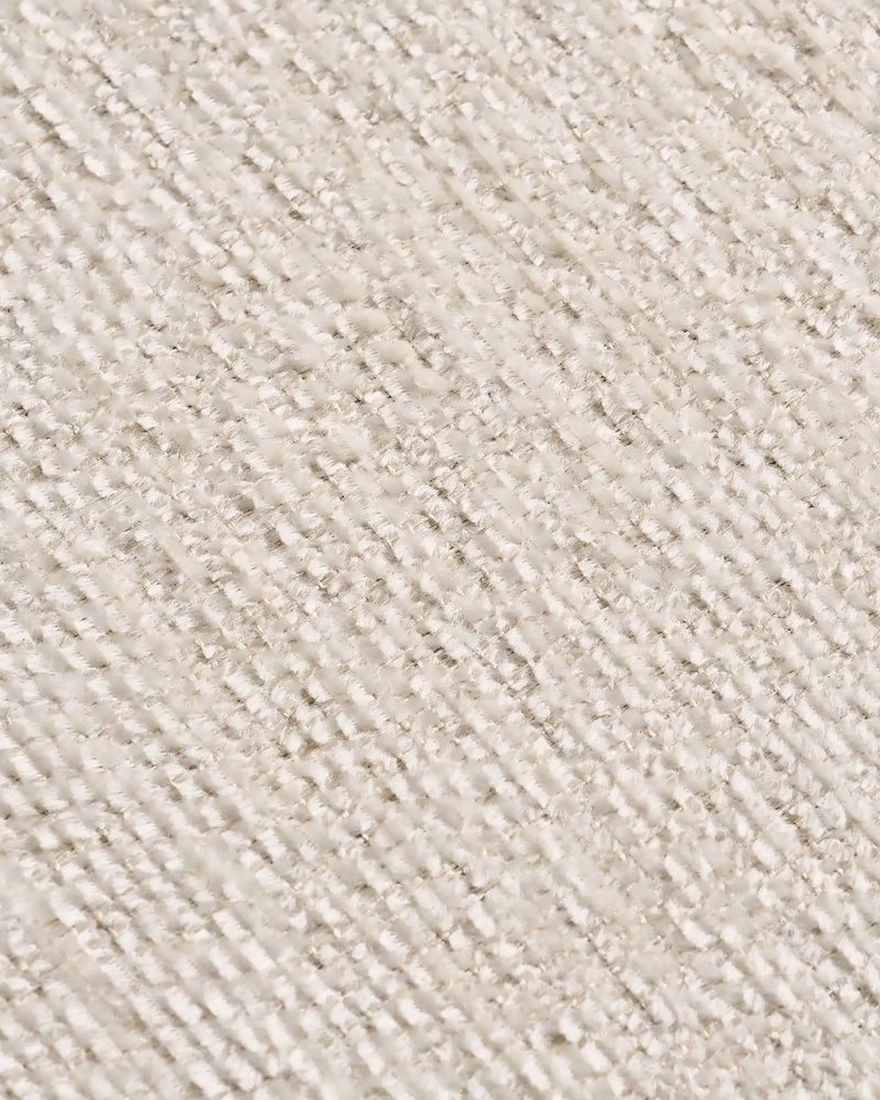 Close-up of the cream chenille fabric on the Nola Modular Sofa