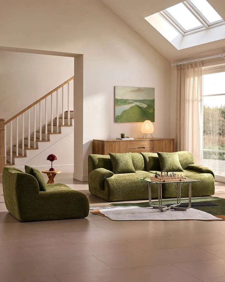 Nola modular sofa reconfigured by removing the middle module to create a compact sofa and a separate standalone armchair.