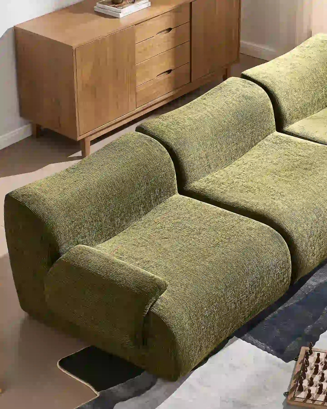 Close-up of the Nola sofa sections joined together, showcasing the seamless look and generous seating depth.