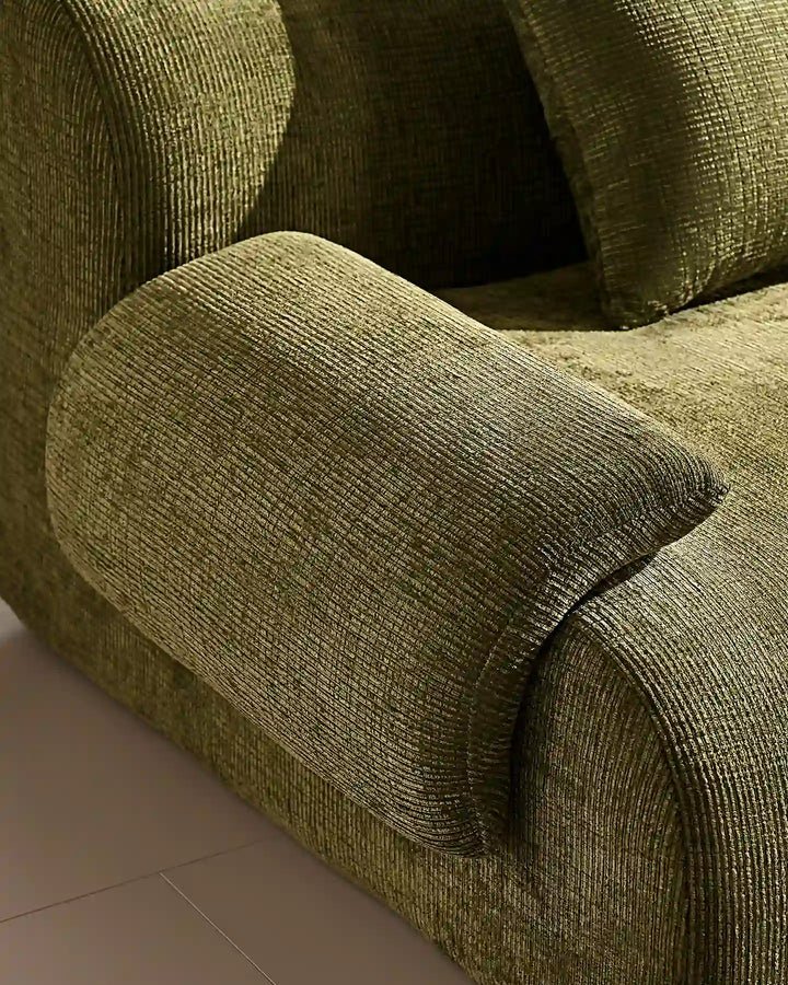 Luxury cream chenille fabric texture of the Nola sofa, durable and soft-to-the-touch.